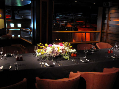 The gorgeous upstairs private dining room at Herb Alpert's Vibrato Grill Jazz...etc. can be configured several ways, as one room or two. With a bird's-eye view of the stage and large flat screens on the walls for close-up entertainment (or other visual aids), it's the perfect private room for special events and meetings. Or a Winemaker's Dinner...