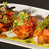 This luscious Fingerling Potato Knish with Smoked Wild Salmon, Champagne-soaked Toasted Mustard Seeds and Lemon-Dill Cr�me Fraiche (an original Vibrato signature dish) is an appetizer, also on the Bar Menu. (3 per order.)